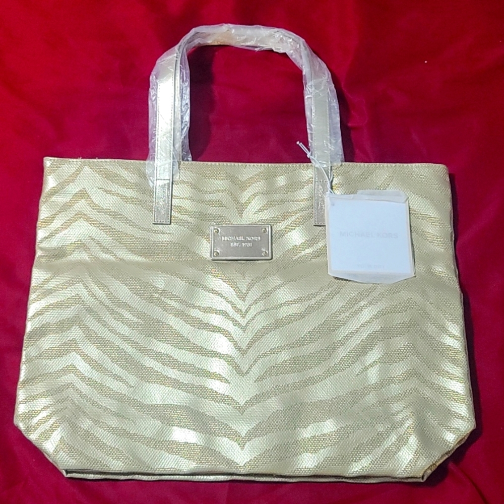 Large michael kors tote bag purse metallic gold brown animal print design